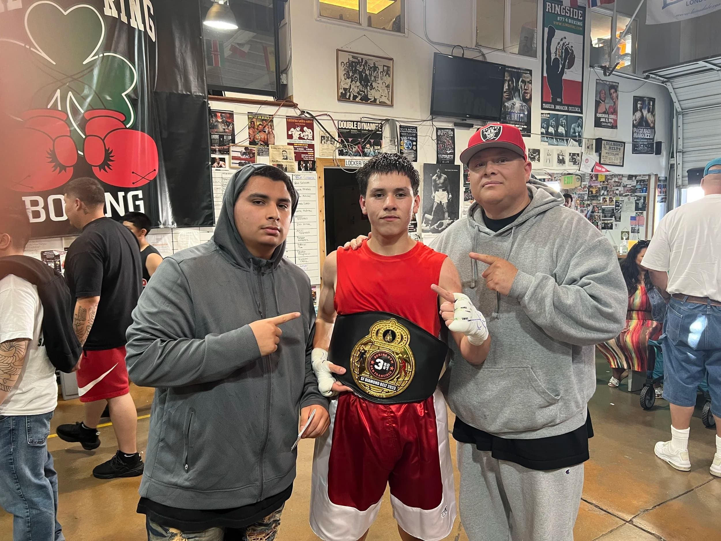 Coach and teenage boxer with the SF Diamond Belt